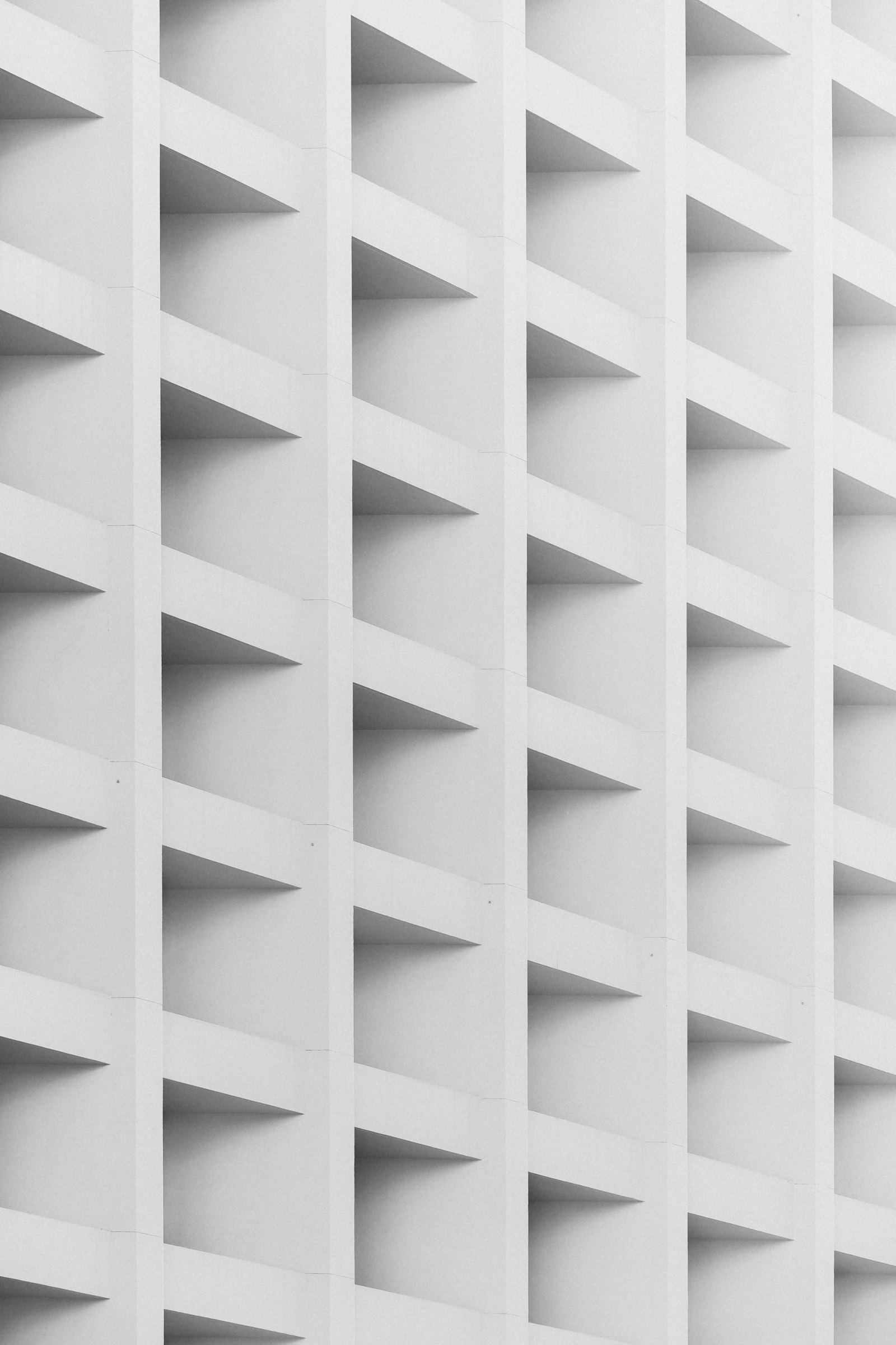 Repeating windows on a white building facade, Hong Kong